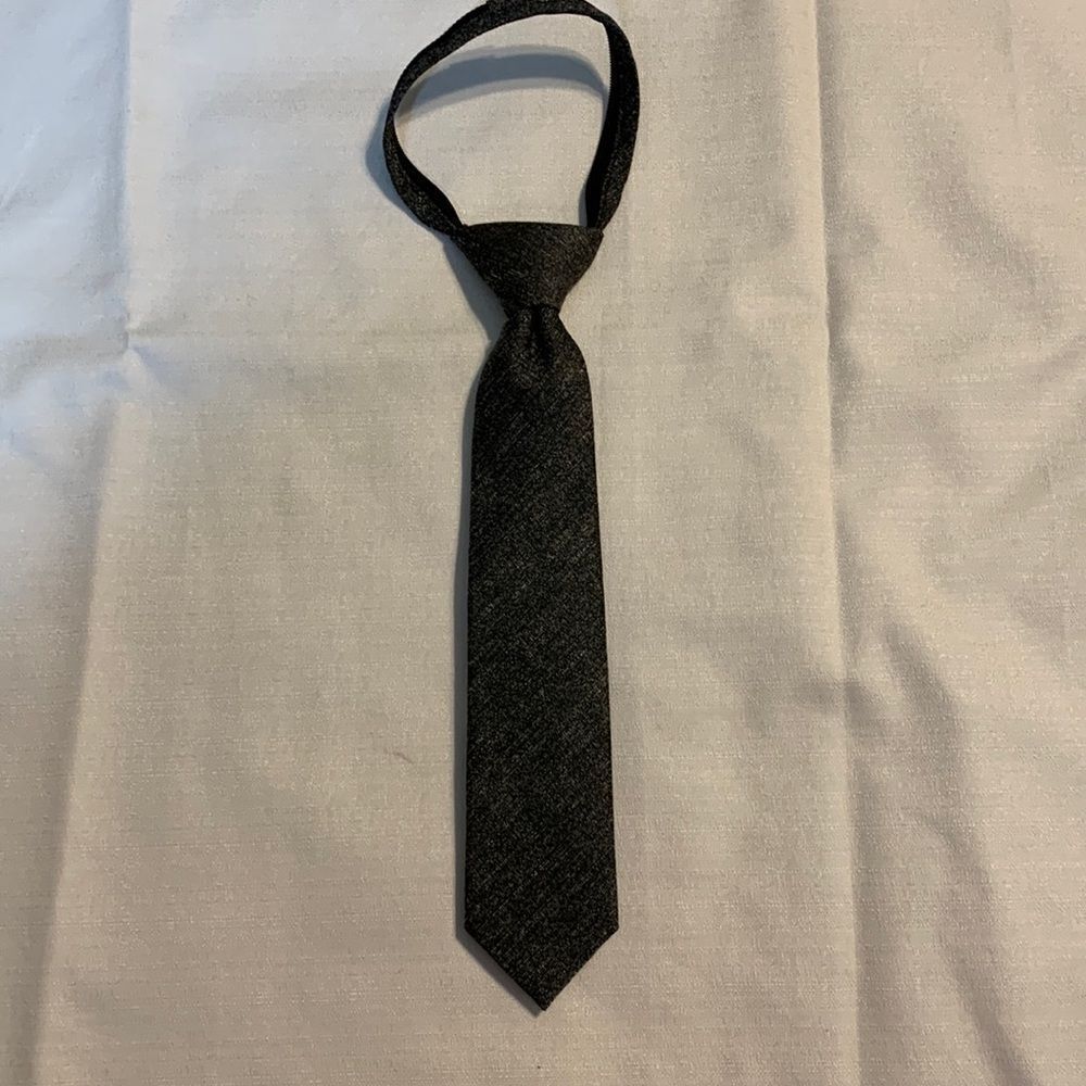 Boys woven zip necktie.  Built in zipper for loosening and tightening